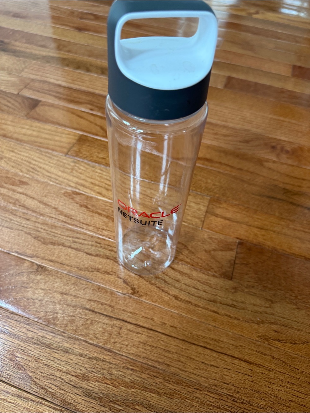 Oracle NetSuite Clear Water Bottle with Gray/White Cap
